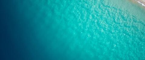 Aerial View of Turquoise Water and Sandy Beach photo