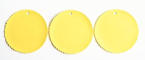Three Yellow Blank Round Paper Tags with Hole for String photo