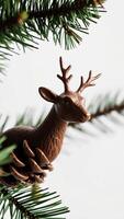 Reindeer Ornament on Pine Branch photo