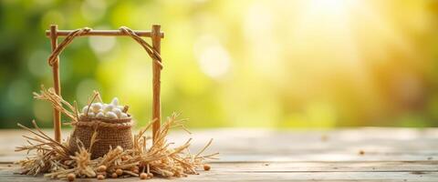 White beans in a burlap sack on a wooden table with a green bokeh background photo