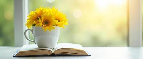 Sunflowers in a White Mug on an Open Book photo
