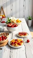 Sunny Breakfast Table with Fresh Tomatoes and Pastries photo