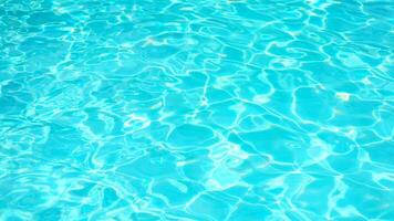Swimming Pool Surface With Light Reflection and Water Ripple Patterns photo