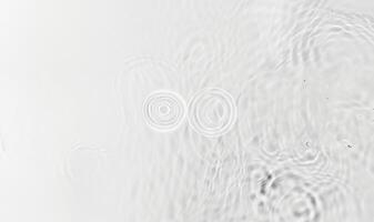 Abstract water ripples with gentle waves and soft reflections, perfect for backgrounds, design elements, and calming visuals. photo