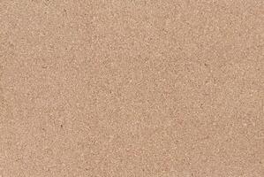 Natural Cork Board Texture Background with Fine Granular Surface photo