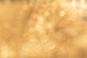 Elegant Abstract Gold Bokeh with Nature-Inspired Shadows, Perfect Background for Presentations and Mock-Ups photo
