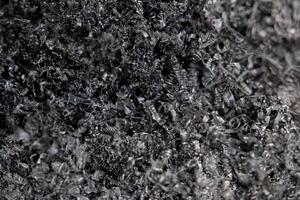 Close-up of Metal and Plastic Scraps from CNC Lathe Machine Turning Process photo