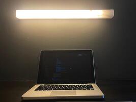 Laptop with Code on Screen.JPG photo