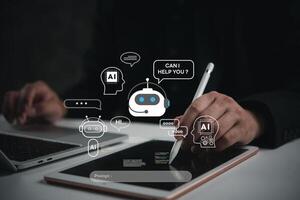 Hand using tablet with AI chatbot icons, representing digital assistance. Ideal for customer service automation, AI interaction, virtual support solutions. photo