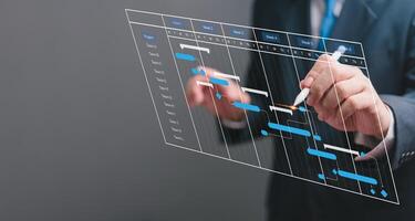 Businessperson managing project schedule with digital Gantt chart. Modern project planning, task management, progress tracking. Professional workspace, strategic efficiency, futuristic technology. photo