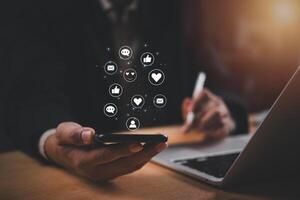 Digital online social media network online concept. Businessmen using smartphone technology communications working and chat message app multimedia. photo