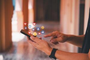 Man with smartphone showing social media likes, concept of online network connection digital technology communication interaction. photo