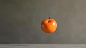 A Single Ripe Orange Plum Floating in Mid-Air photo