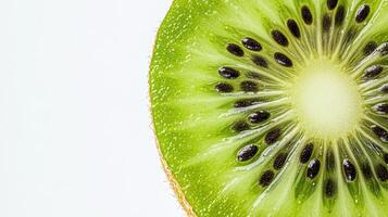 Close-up of a Sliced Kiwi with Visible Seeds and Flesh photo