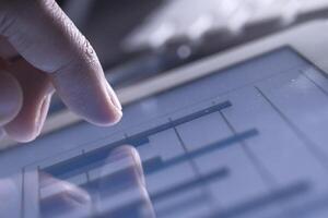 A Comprehensive and Detailed Data Analysis Presented on a Tablet Screen for Insights photo