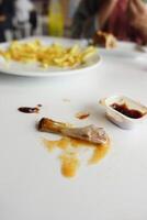 Spilled sauce and a messy table at the restaurant highlighted its cleanliness problems photo