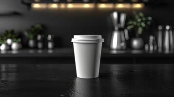 A white coffee cup sits on a counter in front of a kitchen photo