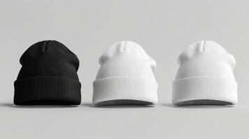 Three hats are displayed on a table, one black and two white photo