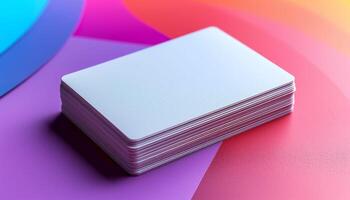 A stack of white cards is on a purple background photo