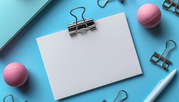 A white piece of paper with a clip on it and a pink ball on the right photo