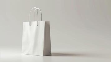 A white shopping bag is sitting on a white background photo