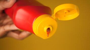 A CloseUp of a Ketchup Bottle that has an Open Lid Ready to Use for Dipping and Adding Flavor video