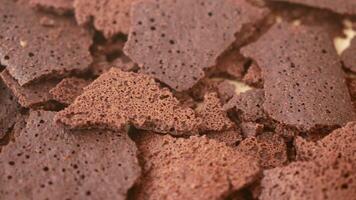 CloseUp View of Chocolate Bark Featuring a Textured Surface with Distinct Air Pockets video