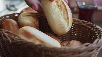 Delicious Freshly Baked Bread Rolls Arranged Neatly in a Rustic Basket for Enjoyment video