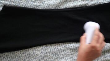 Fabric Care Tips Effectively Removing Lint from Your Black Leggings Using a Lint Roller video