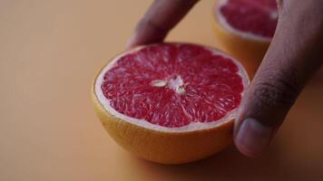 Beautifully Freshly Cut Grapefruit Halves Arranged on a Soft and Gentle Background video