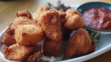 Crispy Fried Chicken Bites with Dipping Sauce, a delectable appetizer for food enthusiasts video