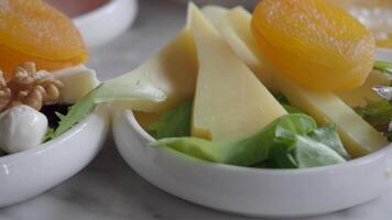 A Fresh and Flavorful Appetizer Accompanied by Cheese and a Pickled Garnish for Tasting Delight video