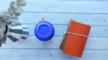 smart speaker clock and notebook on table video