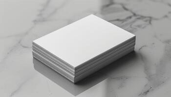A stack of white papers on a marble countertop photo