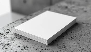 A white piece of paper sits on a table photo
