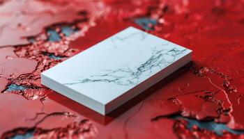 A white card with a red background photo