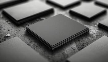 A stack of black business cards with a white background photo