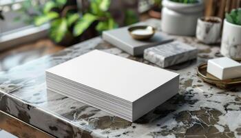 A stack of white paper is on a table photo