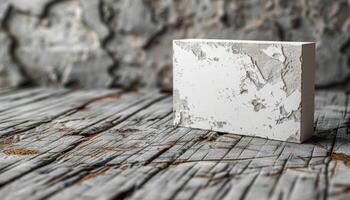A white box sits on a wooden floor photo