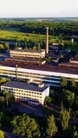 Old Abandoned Factory Buildings. Abandoned old factory buildings with closed door and windows Vertical video