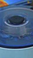 Modern technologies in medical equipment. Medical device centrifuge in process for mixing in the laboratory Vertical video
