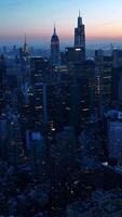 Fantastic scenery of skyscrapers in New York city. Metropolis with modern architecture at sun dusk time. Vertical video