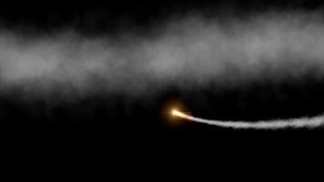 A trail of fire smoke and sparks from a fast-moving missile. The rocket quickly flies past the frame and flies away. Jet engine smoke overlay. Spaceship Isolated on black background video