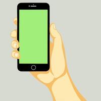 Hand Holding a Smartphone. A hand holds a smartphone with a green screen against a gray background. vector