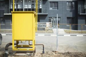 Gas equipment in city. Gas pipe. Technical structure. photo