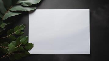 Flat lay of blank white sheet of paper mockup foliage placed on black surface. Bordered by lush green tropical leaves template advertising image. Nature-themed mock up photorealistic photo