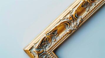 Vintage baguette frame corner on blue background closeup image. Elegant picture border with patterns close up photography. Art work decorative element concept photo realistic
