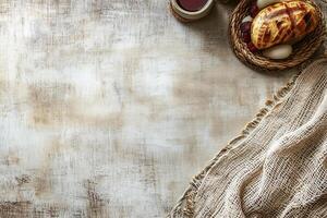 Rustic background with burlap fabric and easter food offering copy space Yom Kippur photo