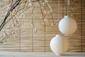 Two white paper lanterns hanging providing minimalist warm light Sukkot photo