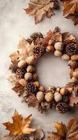 Autumn Wreath with Pine Cones Acorns and Leaves on White Background photo